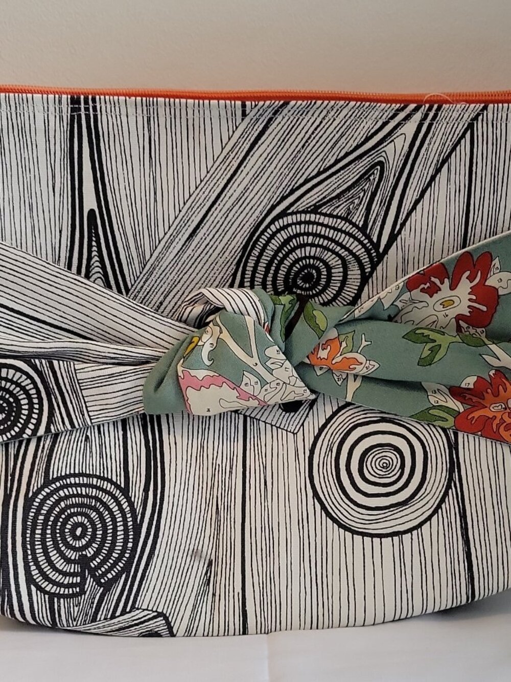 Jennifer Allard clutch, woodgrain floral, bow accent, zip, inner pockets